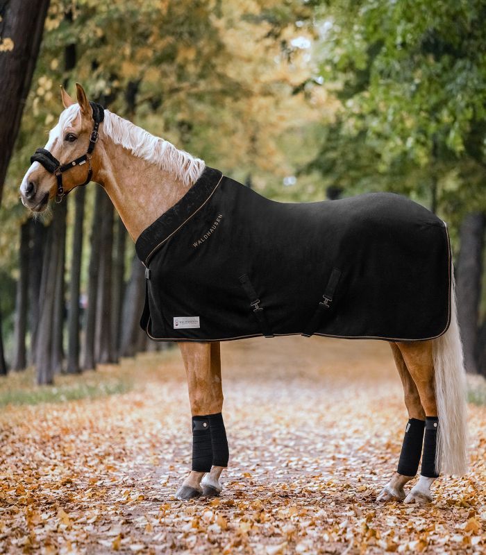 Fleece rug with soft synthetic fur collar