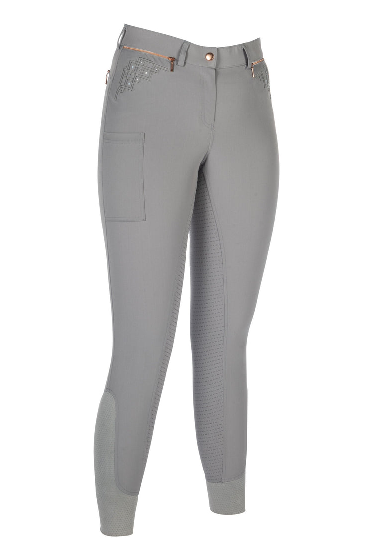 Riding breeches in rosegold color with a full silicone seat, featuring a front button closure, practical pockets, and subtle sparkle details on the pocket area.