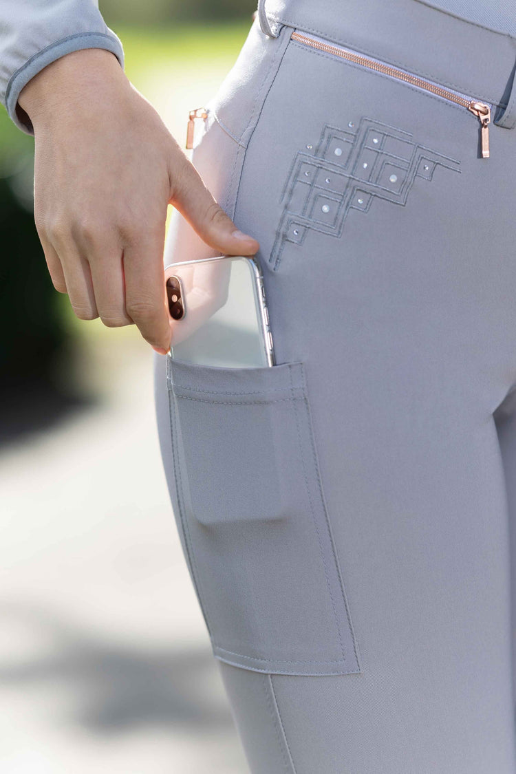 Grey riding breeches with large phone pocket