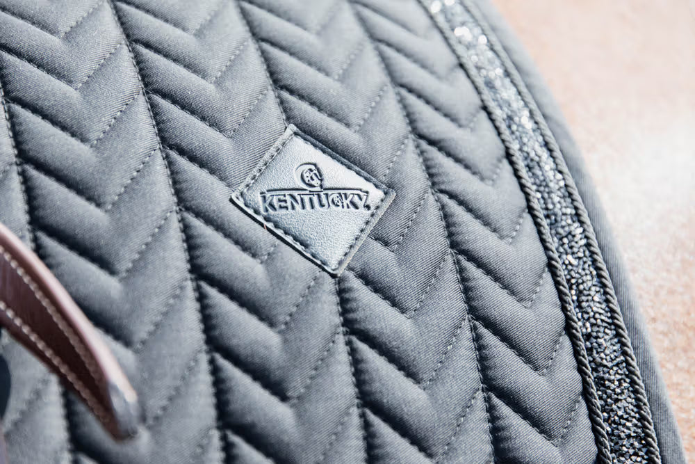 Close up of Kentucky Horsewear Glitter Saddle Pad in black