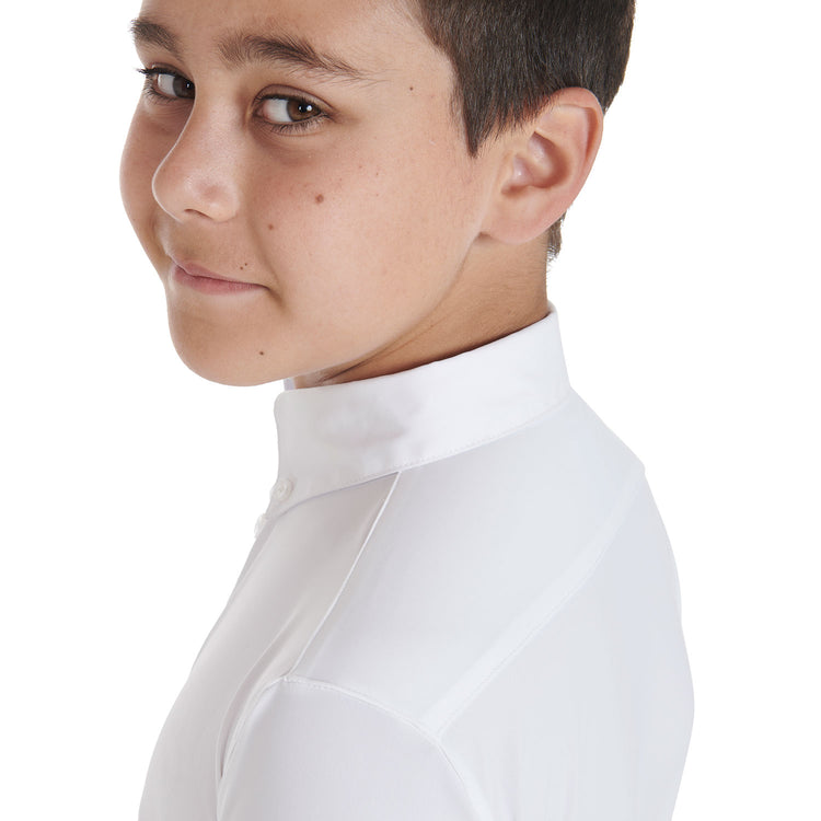 boys horseback riding white shirt