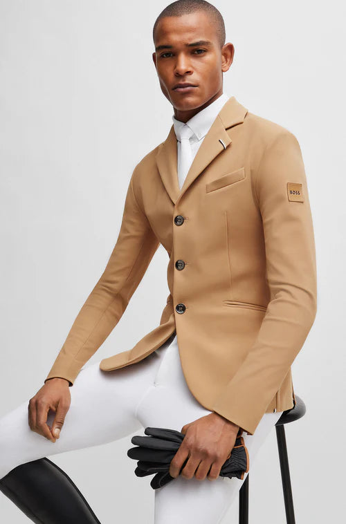 Man wearing a Boss Equestrian show jacket in dark beige