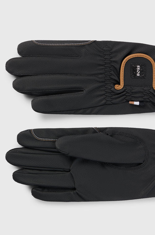 Black and tan horse riding gloves
