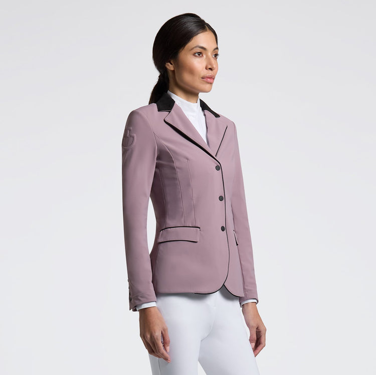 Woman wearing a Cavalleria Toscana GP Zip competition jacket in Grape Shake