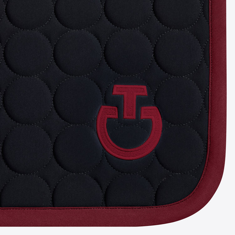Cavalleria Toscana circular quilt saddle pad in black and burgundy