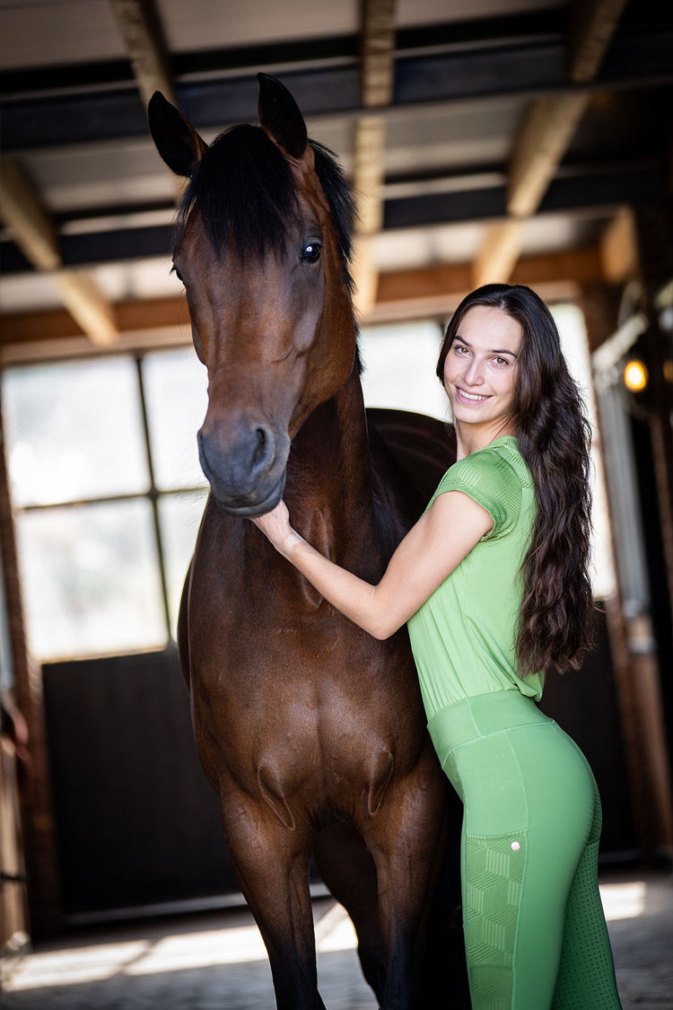 Green horse riding outfit