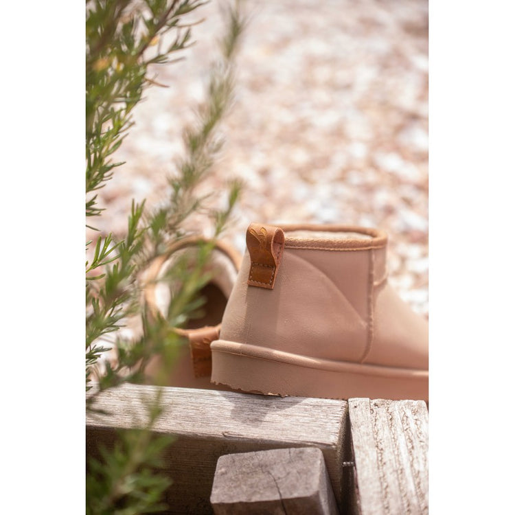 Brown winter stable boots with a short practical design for colder weather.