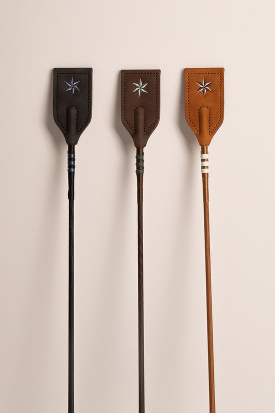 Elegant jumping whip with a comfortable grip for refined riding aids