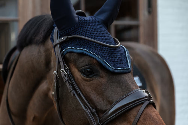 Extended neck piece to prevent the fly veil from slipping