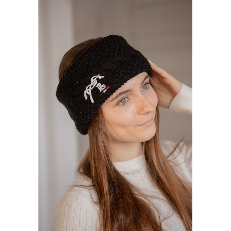 Fleece-lined knitted winter headband designed to keep ears warm