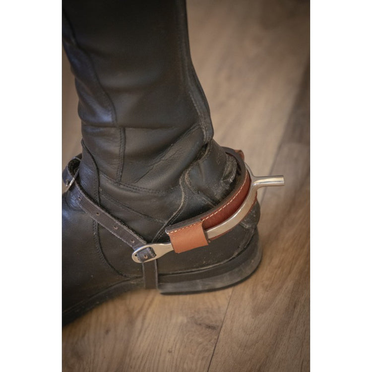 Leather spur guards for riding boots with a practical protective design.