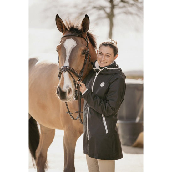 Penelope Fashion Rain riding jacket designed for wet weather at the stable and in the saddle.