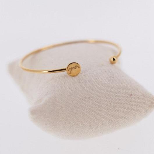 Penelope Jonc equestrian bangle with elegant half-oval shape for a comfortable fit.