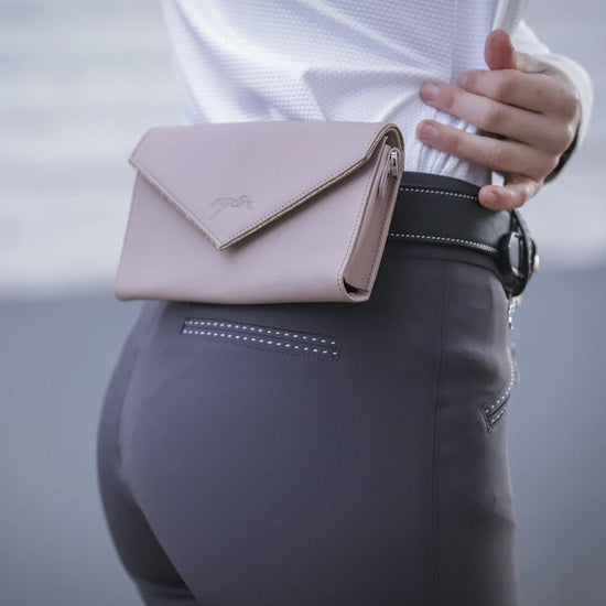 Penelope perforated leather phone bag with practical belt loops and envelope-style flap.