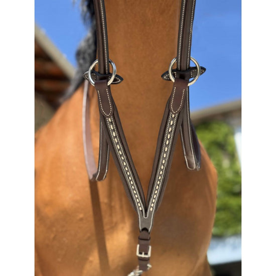 Penelope Point Sellier martingale attachment with two rings designed to slide onto the reins.