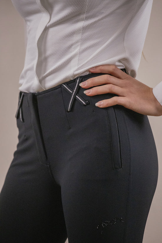 Penelope Zuri riding breeches with practical zipped pockets and feminine detailing.