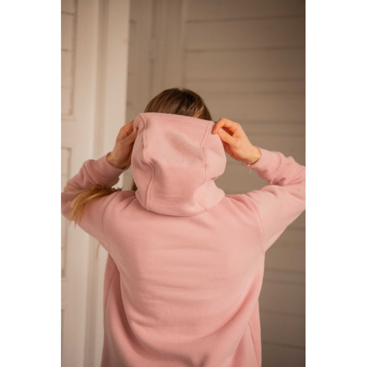 Person wearing a pink hoodie with their back to the camera.