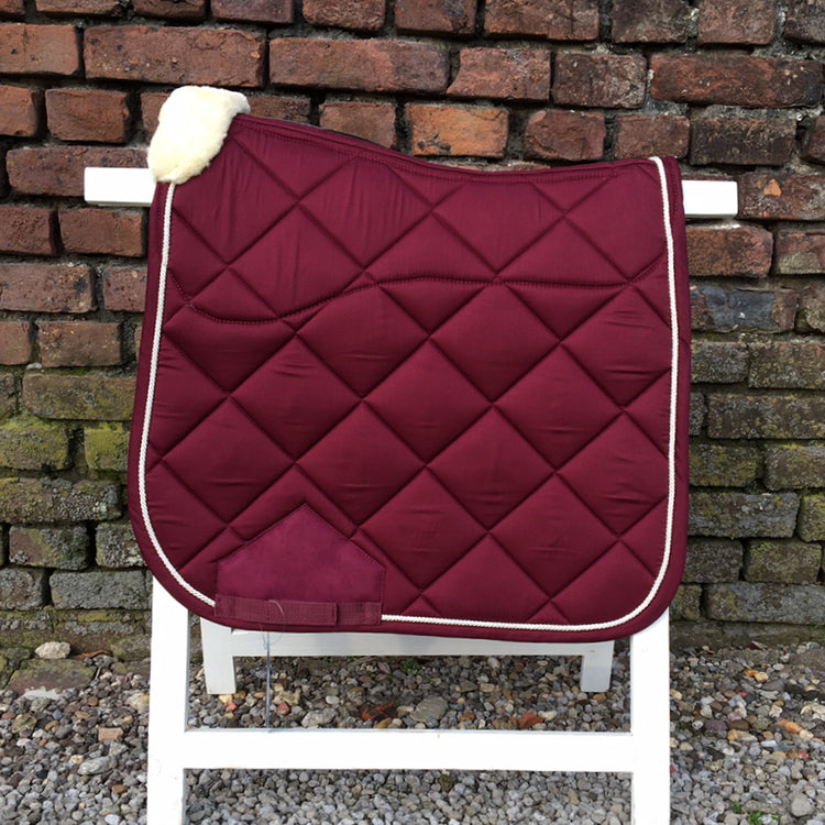 Burgundy saddle pad with sheepskin