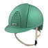 Turquoise colored horse riding helmet