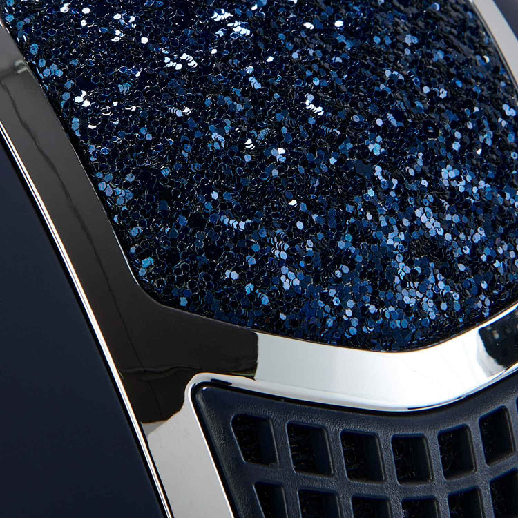 Close up of shiny stones on Navy horse riding helmet from equestro