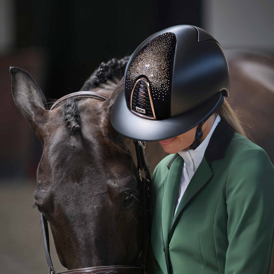 Lady with her horse wearing a Kep Italia glitter helmet