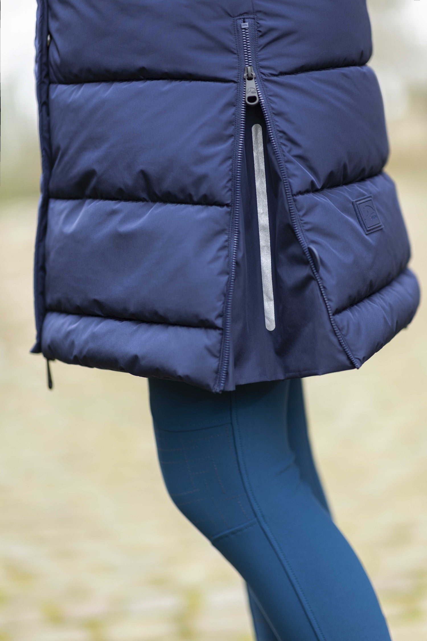 Horse riding vest with side zips