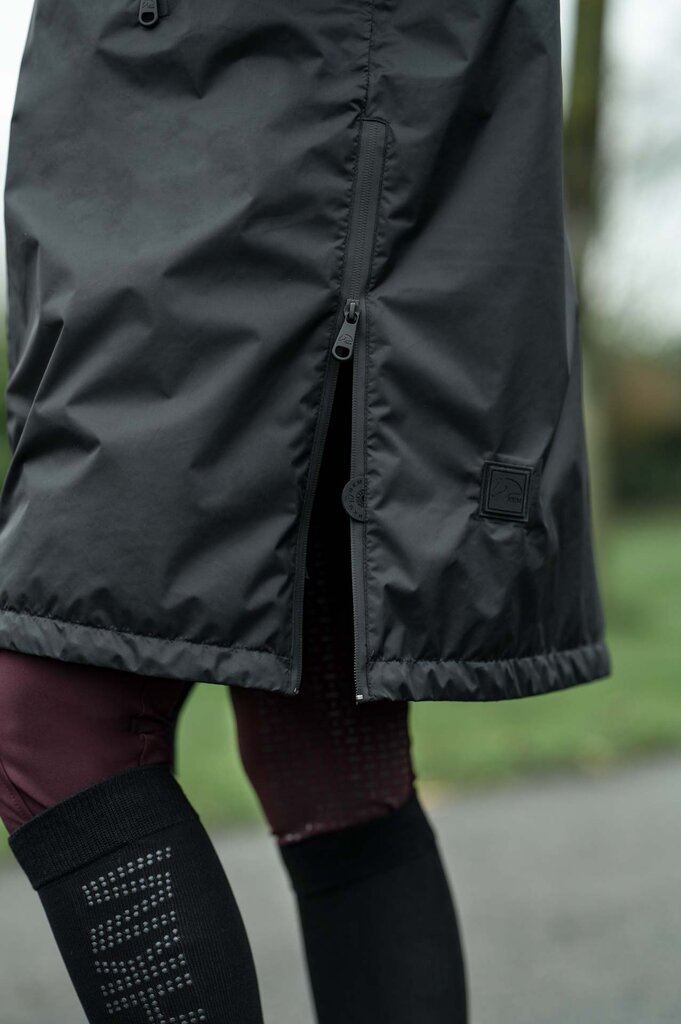 Waterproof horse riding jacket with slits