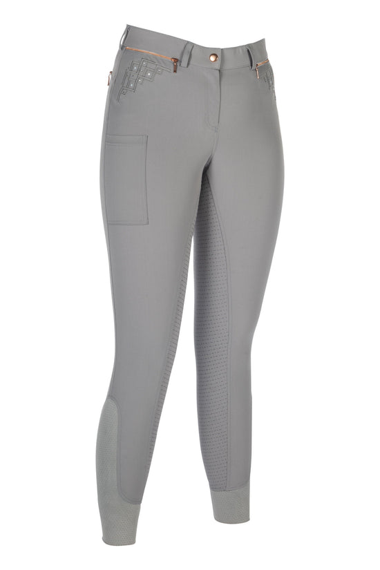 Riding breeches in rosegold color with a full silicone seat, featuring a front button closure, practical pockets, and subtle sparkle details on the pocket area.