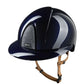 Riding helmet with silver glitter top and beige chin strap