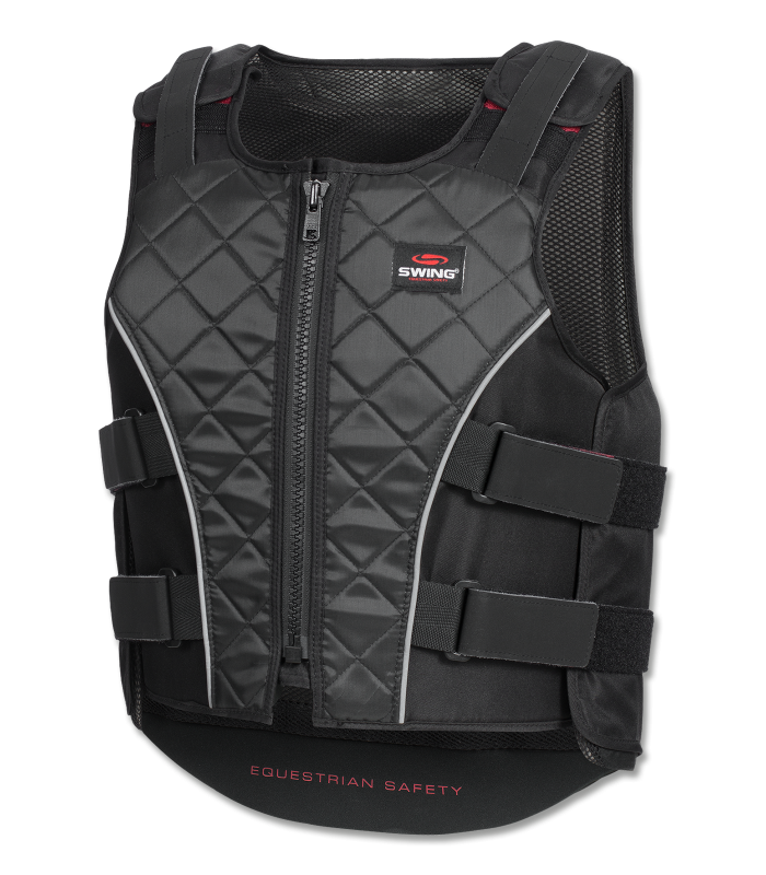 Equestrian adjusting the waist closure on the Body Protector for a secure and snug fit