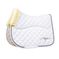 White saddle blanket with sheepskin on underside