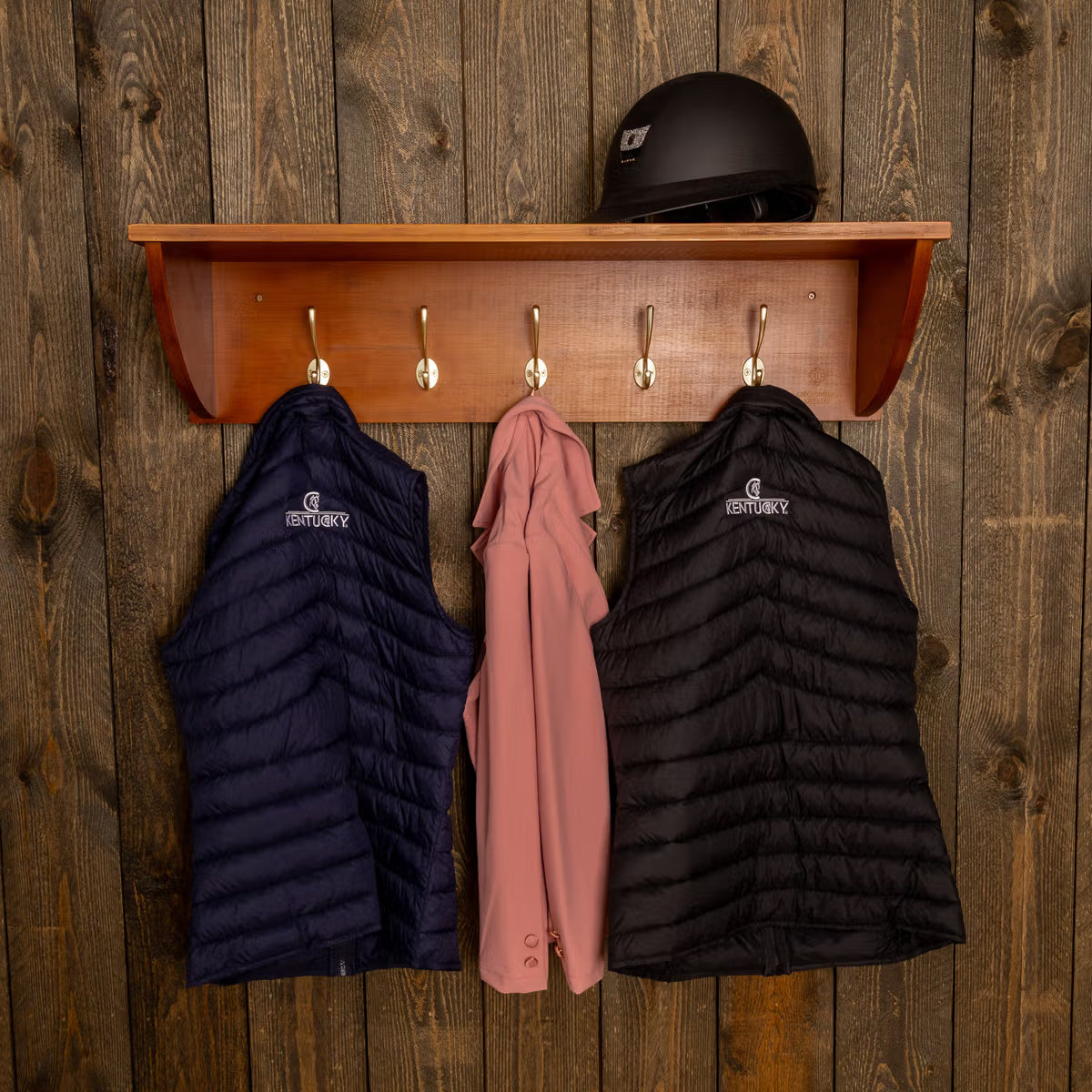 Bamboo helmet shelf with hooks for riding gear