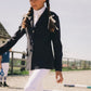 Young rider wearing Kentucky Paris Girl show jacket
