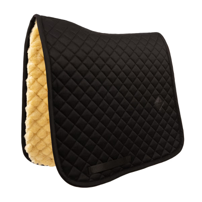 Breathable sweat absorbing saddle pad to prevent heat build up