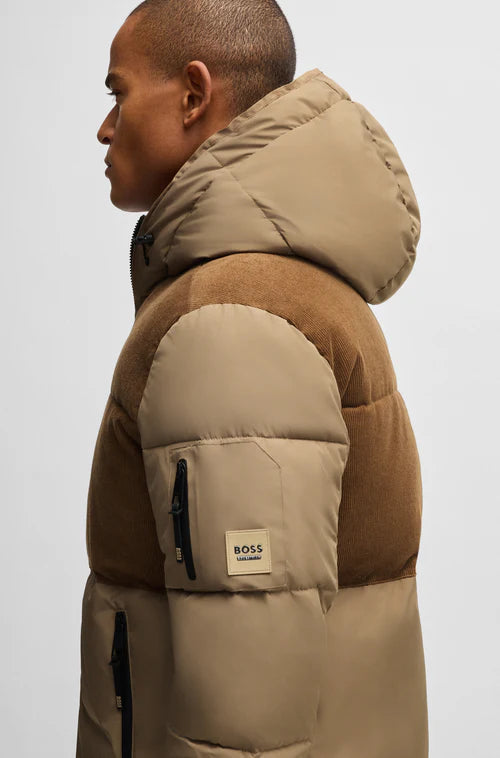 Man wearing a BOSS equestrian Tomas jacket with large hood in camel