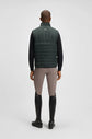 Man wearing the Boss Equestrian Ruben Puffer vest in Pine green