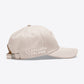 Beige cap with &