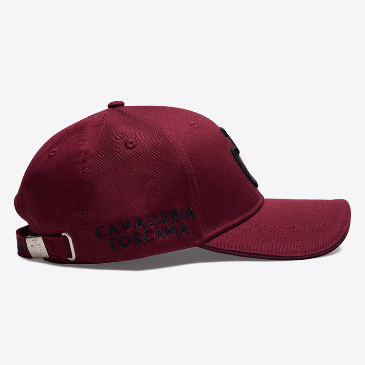 Maroon cap with Cavalleria Toscana text on the side