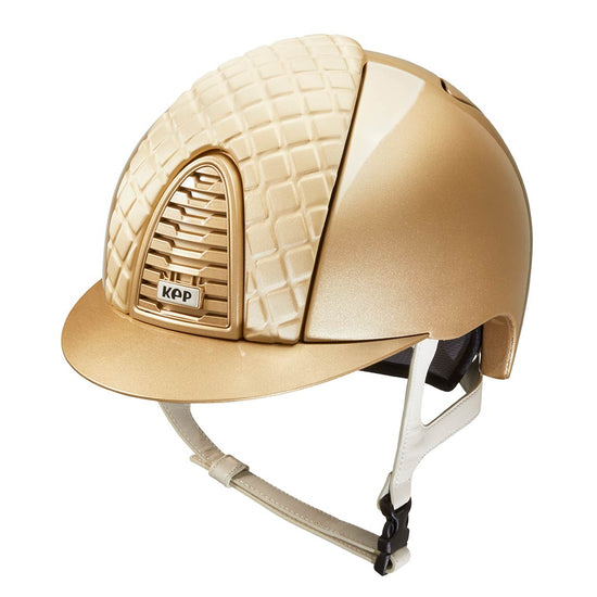 Gold colored horse riding helmet