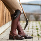 Unique under-knee elastic strap and foot strap with leather overlay