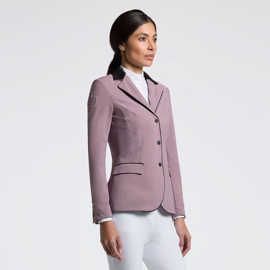 Woman wearing a Cavalleria Toscana GP Zip competition jacket in Grape Shake