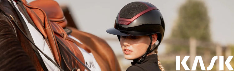 Kask equestrian helmet in black with burgundy frame & Swarovski Carpet on rider with bay horse – luxury equestrian equipment from Equizone Online