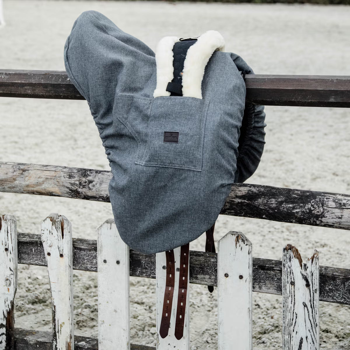 Artificial rabbit skin inside saddle cover