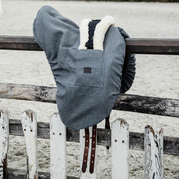 Artificial rabbit skin inside saddle cover