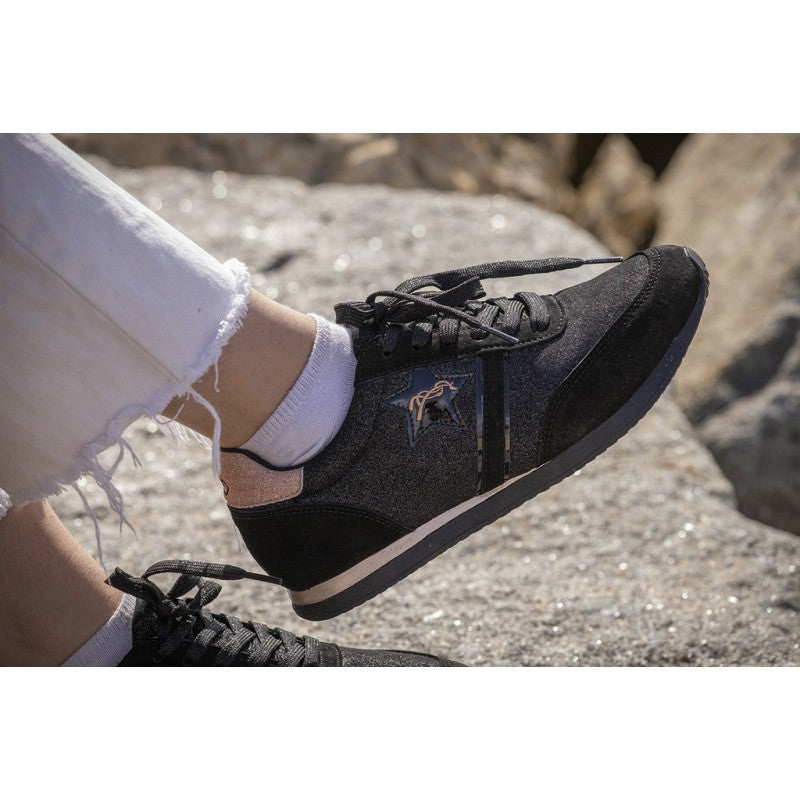 Black glitter sneakers with rose gold details and shiny black shoelaces.