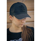 Breathable equestrian mesh cap designed to provide ventilation during warm days.