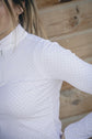 Breathable long sleeve riding shirt for horse shows and competitions.