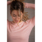 Breathable long sleeve riding top designed for lightweight comfort during equestrian sports.