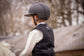 Children’s equestrian airbag vest designed to protect young riders.