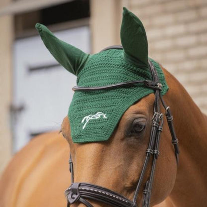 Crochet horse ear bonnet with flexible stretch ears for comfort during riding.